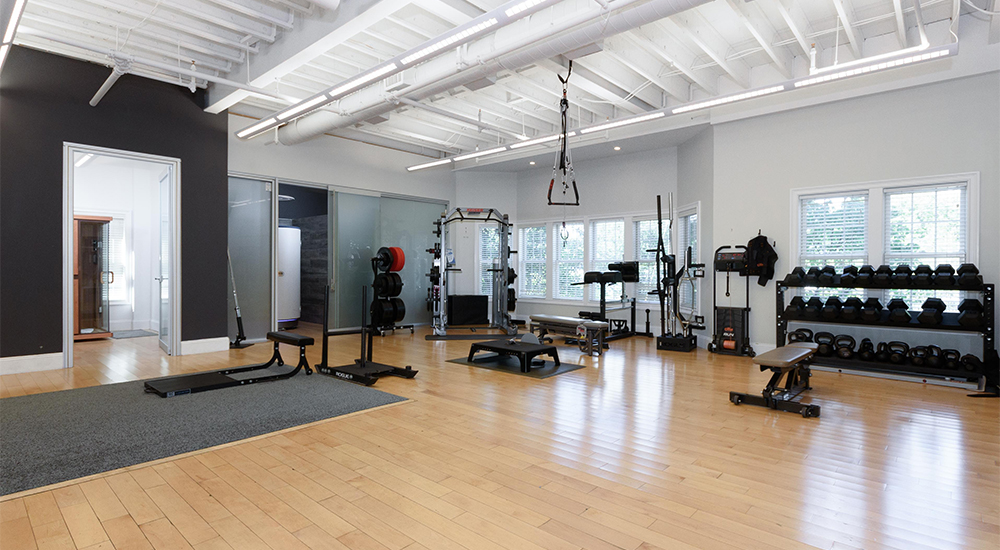 Training area with gym equipment