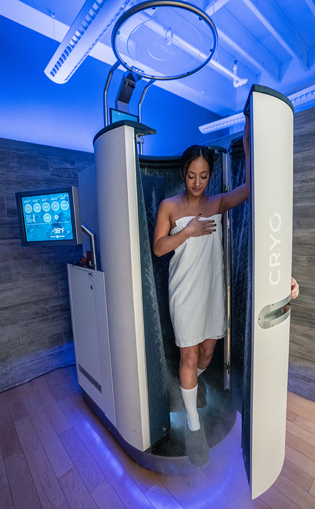 woman leaving a whole body cryotherapy tank