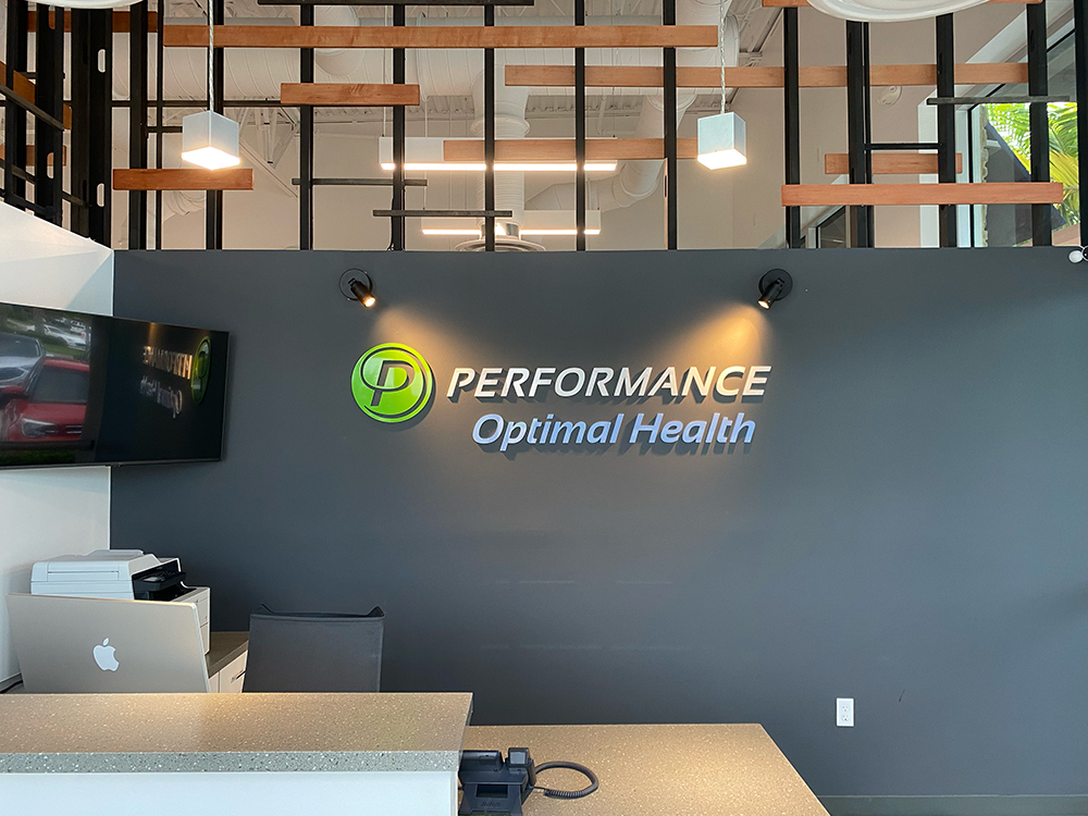 front desk with Performance logo