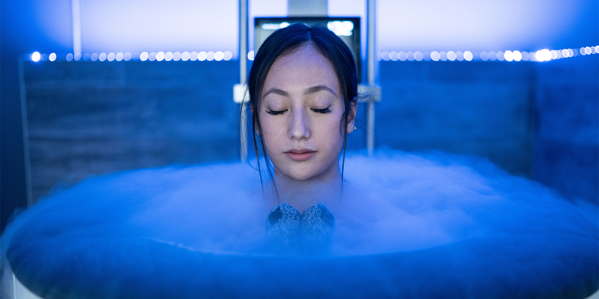 woman inside a cryotherapy chamber